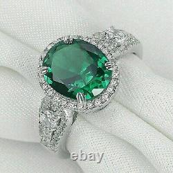 3Ct Oval Cut Lab Created Emerald Halo Engagement Ring In 14K White Gold Finish