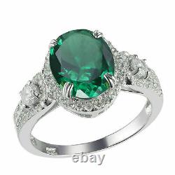 3Ct Oval Cut Lab Created Emerald Halo Engagement Ring In 14K White Gold Finish