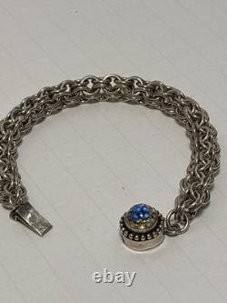 81/2 Heavy linked sterling silver bracelet with millefiori gem on clasp marked
