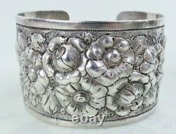 Big sterling silver heavy floral repousse antique cuff bracelet