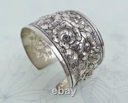 Big sterling silver heavy floral repousse antique cuff bracelet