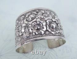 Big sterling silver heavy floral repousse antique cuff bracelet