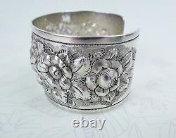Big sterling silver heavy floral repousse antique cuff bracelet