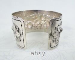 Big sterling silver heavy floral repousse antique cuff bracelet