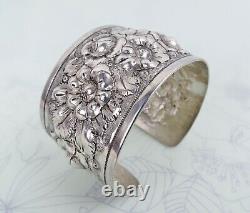 Big sterling silver heavy floral repousse antique cuff bracelet