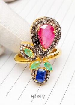 Pear Cut Ruby, Square Blue Sapphire, Marquise Emerald and Round Diamond Ring