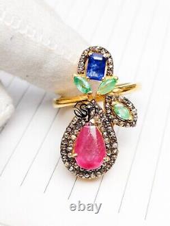 Pear Cut Ruby, Square Blue Sapphire, Marquise Emerald and Round Diamond Ring