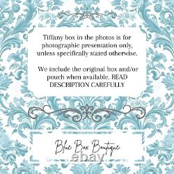 Tiffany & Co. Atlas Ring Vintage Classic Roman Numerals Band in Sterling Silver