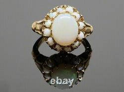 Vintage 4.20CT Oval Cut Opal Halo Women's Engagement Ring 14K Yellow Gold Finish