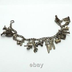 Vintage Antique Sterling Silver Charm Bracelet with 17 Charms Many Articulated