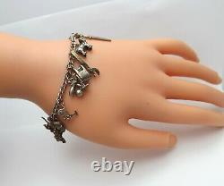 Vintage Antique Sterling Silver Charm Bracelet with 17 Charms Many Articulated