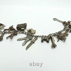 Vintage Antique Sterling Silver Charm Bracelet with 17 Charms Many Articulated