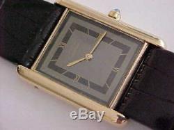 Vintage Preowned Man's Quartz Cartier Tank With Gray & Black Tuxedo Dial Sharp