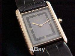 Vintage Preowned Man's Quartz Cartier Tank With Gray & Black Tuxedo Dial Sharp