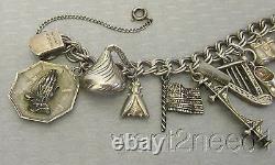 Vtg STERLING SILVER CHARM BRACELET 20P loaded Eiffel Tower bee kiss shoe key 52g