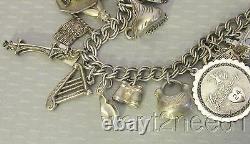 Vtg STERLING SILVER CHARM BRACELET 20P loaded Eiffel Tower bee kiss shoe key 52g