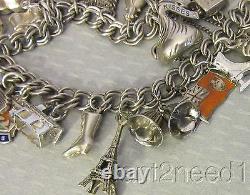 Vtg STERLING SILVER CHARM BRACELET 20P loaded Eiffel Tower bee kiss shoe key 52g