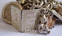 Bracelet de charme vintage en argent massif lourd avec 30 charms en argent, articulé, rare