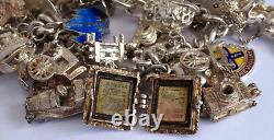 Bracelet de charme vintage en argent massif lourd avec 30 charms en argent, articulé, rare