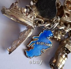 Bracelet de charme vintage en argent massif lourd avec 30 charms en argent, articulé, rare