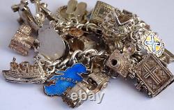 Bracelet de charme vintage en argent massif lourd avec 30 charms en argent, articulé, rare