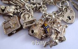 Bracelet de charme vintage en argent massif lourd avec 30 charms en argent, articulé, rare