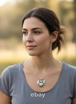 Pendentif en argent sterling vintage en forme de cœur boho avec un design de volutes orné