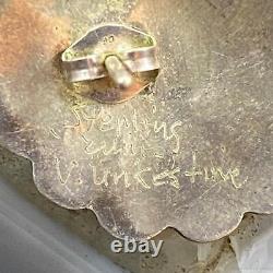 V. Unkestine Boucles d'oreilles clous en argent sterling vintage Zuni avec incrustation de plusieurs pierres en forme de visage de soleil.